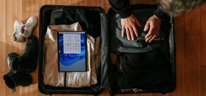 Person packing things to one small bag