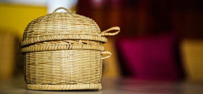 brown woven basket on brown wooden table